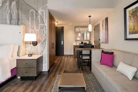 Spread out comfortably with sofa seating and dining workspace.