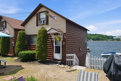 Arrive at your cottage with Newfound Lake right beside the entrance.