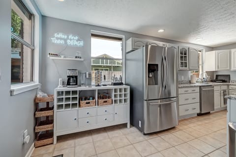 Coffee station and extra storage in the kitchen area.