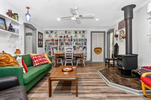 Warm and welcoming living space with comfortable seating and a dining area for shared meals.