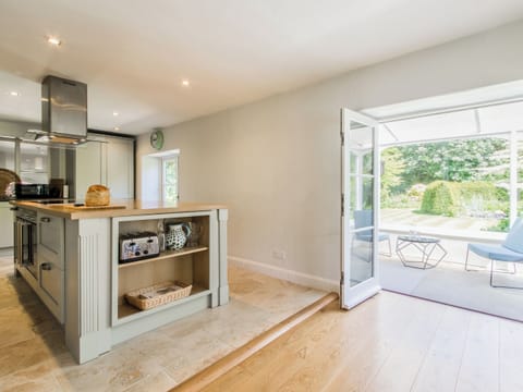 Luxurious kitchen adjoining the dining area | The Dairy House, Illminster