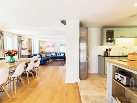 Beautiful dining area with wooden fllor | The Dairy House, Illminster