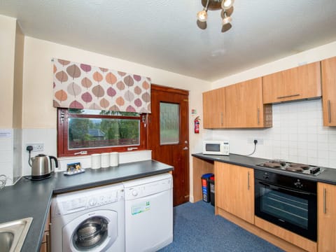 Kitchen | Munro View - Silverglades Holiday Homes, Aviemore