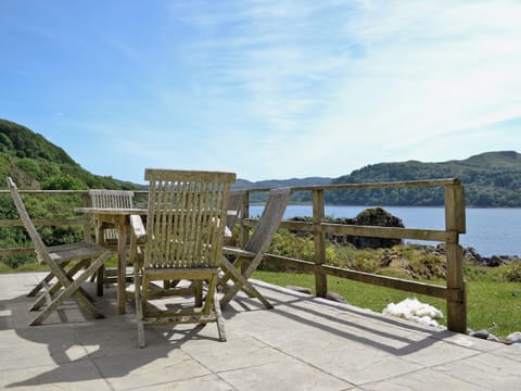 Decked area with garden furniture and BBQ | Tigh Beg Croft, Lerags, near Oban