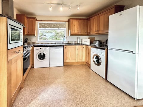 Fully fitted and well-equipped kitchen | Orchid Cottage - Cathair Dhubh Estate, Clachtoll, near Lochinver