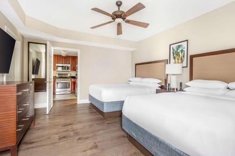 Stretch out in a bright two-queen room after adventures.