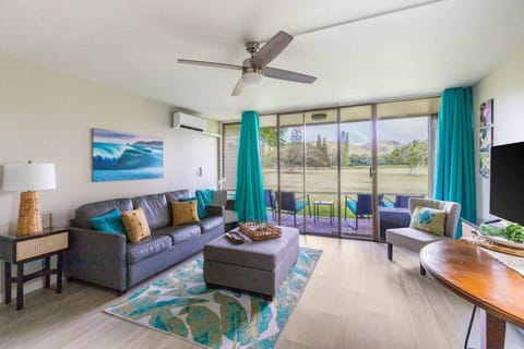 Just through the sliders you'll have access to your private lanai on the Fazio Golf Course with mountain views.  