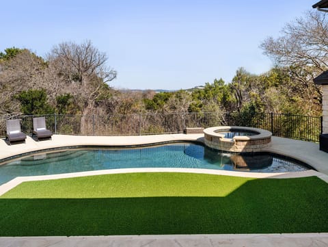 Enjoy stunning sunset views and peaceful rolling hills from this incredible private pool.