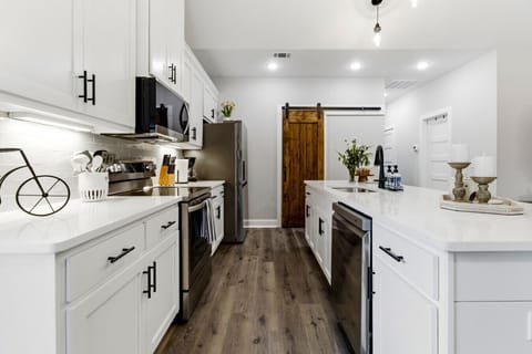 Kitchen | Quartz Countertops | Stainless Steel Range