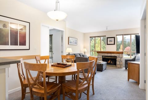 Gather by the cozy fireplace and soak in views.