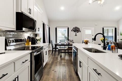 Kitchen | Stainless Steel Appliances | Island Sink & Bar Seating