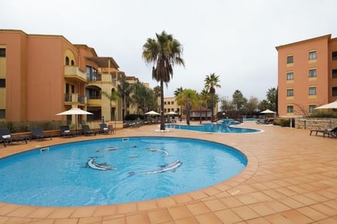 Lounge beside calm waters with plenty of space to relax