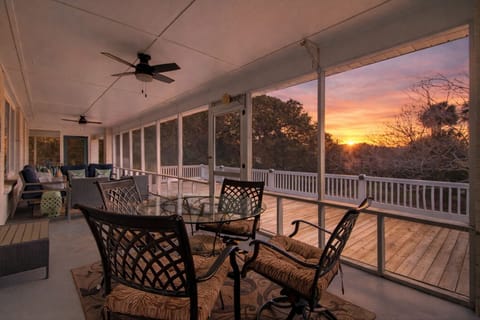 Relax on the breezy screened porch—sip your coffee, dine al fresco, and enjoy peaceful views in every direction.
