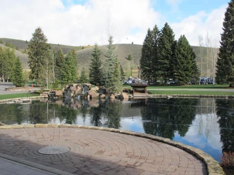 Stroll beside the reflecting pond and breathe in alpine calm.