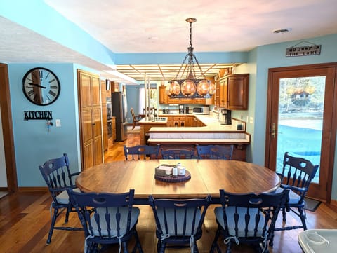 DINING AREA #1:  There is a casual, family-friendly dining area between the kitchen and the living room with seating for up to 8 adults.