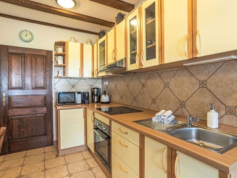 Kitchen, Countertop, Cabinetry, Wood, Interior Design, Flooring, Floor, Furniture, Ceiling, Room