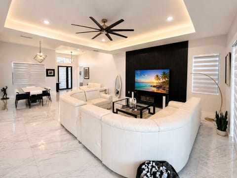 Spacious living room with smart TV for movie nights