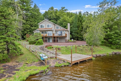 Welcome to your lakefront retreat nestled among the trees