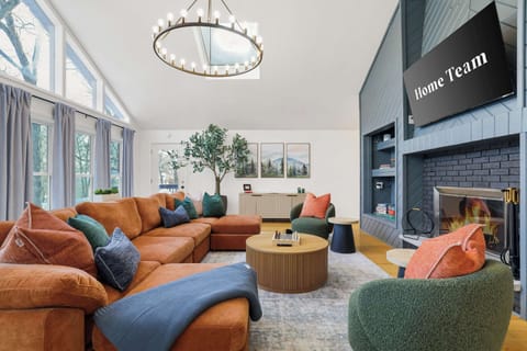 Cozy vibes, comfy seating, and space to lounge or laugh with friends and family—our living room is where vacation mode officially begins.