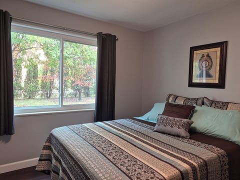 Room 2 with queen bed, separate bathroom with shower & closet. 