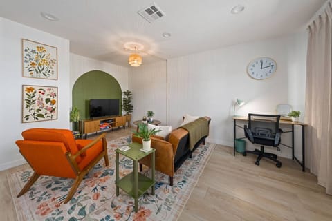 Sink into our bohemian inspired living room where every detail was chosen to make you feel right at home! The soft ambient lighting and thoughtfully curated space create the perfect retreat after a sun soaked Phoenix Day.