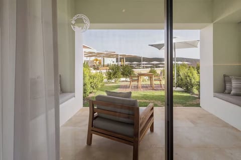 Step outside and lounge privately with garden breezes and sunshine.