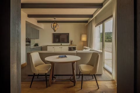 Gather for wine and conversation beside sunlit terrace doors