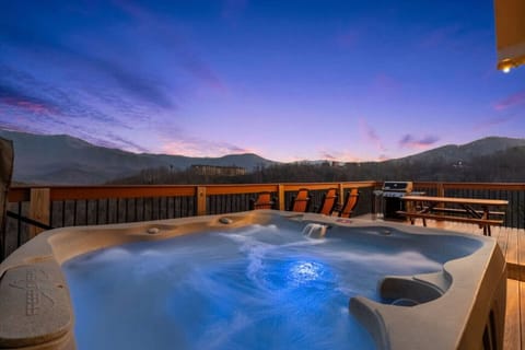 Soak in the hot tub underneath the stars while taking in the view!