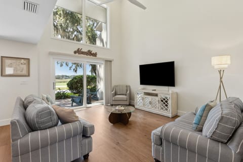 Living room with amazing marsh and golf course views