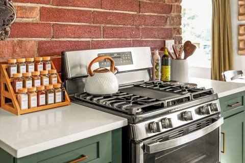 Cooking is enjoyable on the gas range with a double oven option. Spices are provided for your chef's dishes.