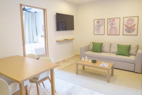 Gather for meals, then unwind on the plush sofa.