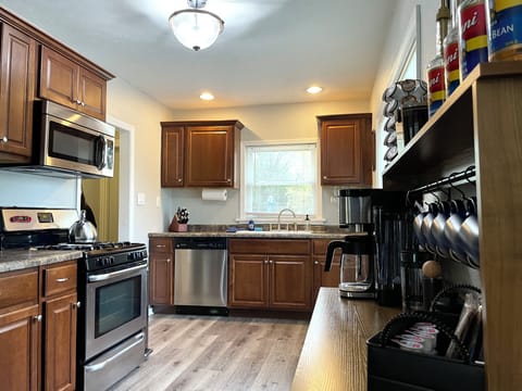 Cook family favorites in the bright fully stocked kitchen with everything you need from morning coffee to midnight snacks. 🍳☕