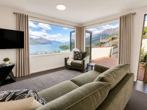 Open plan living area with Lake Wakatipu views at Alpine Lakeview 9B Queenstown