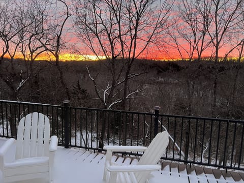 Sunrise on the back deck that is off the extra living room. Excellent views