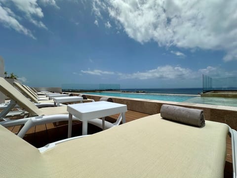 Stretch out in the sun with panoramic sea views.