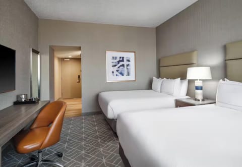 Stretch out after a long day in serene, tidy comfort.