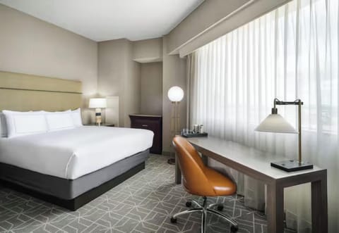 Settle in and work comfortably at the sunlit in-room desk