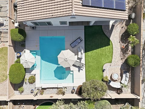 Aerial view of our inviting backyard oasis! A better way to enjoy your vacation.