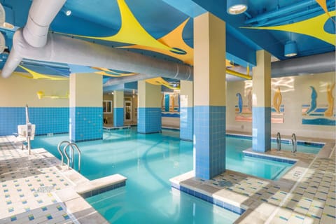 Dive into spacious indoor serenity with bright, airy seating.