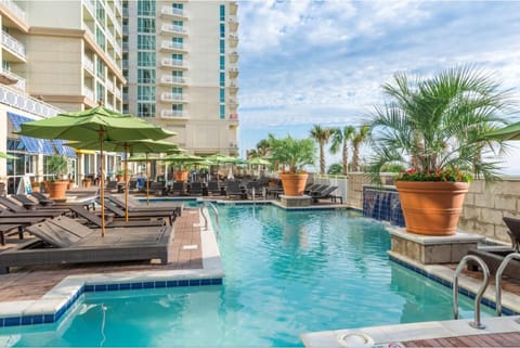 Bask in the sun with plenty of loungers and umbrellas.