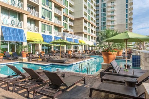 Step out and enjoy resort-style poolside lounging just downstairs.