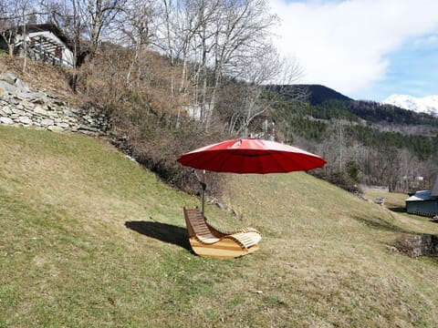 Umbrella, Hill, Outdoor Furniture, Mountain Range, Shade, Lawn, Leisure, Garden, Valley, Ridge