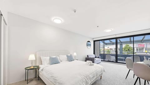 Bright bedroom with large windows
