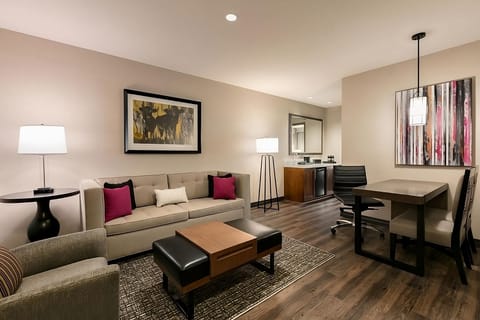 Gather comfortably in the stylish lounge with warm lighting.