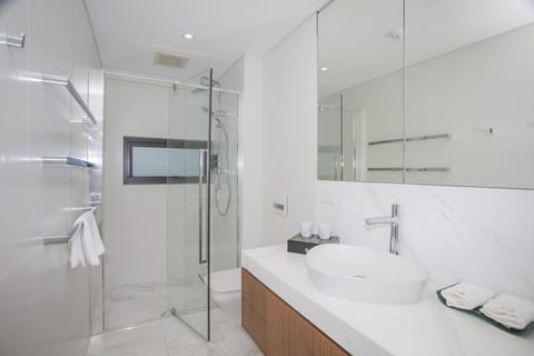 Modern private bathroom with boutique finishes.