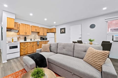 Spacious living area with sofa seating, perfect for relaxing or hosting guests.