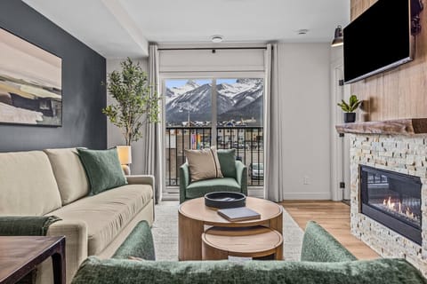 Your mountain sanctuary awaits. Soak in the majestic views of the Three Sisters and Ha Ling Peak while staying steps away from Downtown.
