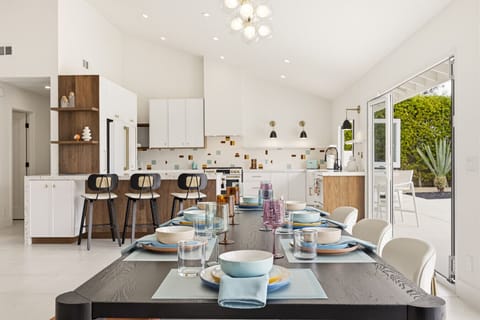 Open-concept dining and retro-chic kitchen.