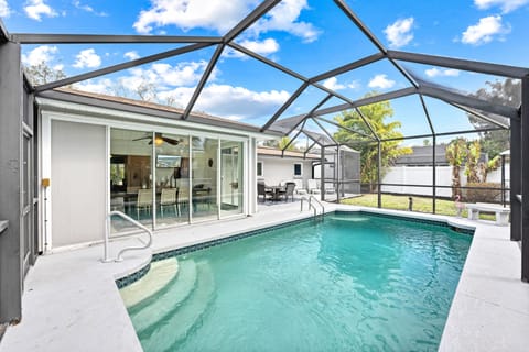 Enjoy your own screened-in pool, perfect for sunny afternoons and relaxed evenings.