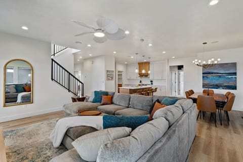 Living Room (Main Floor) - TV, Surround Sound System + see-through double sided fireplace!